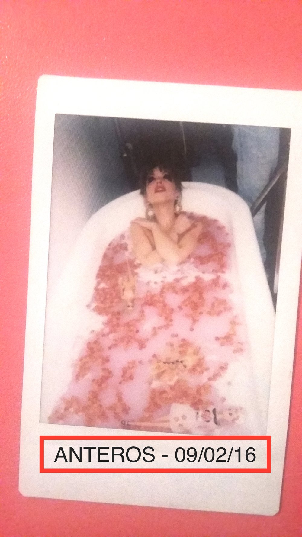 Laura Hayden enjoying a pink cheerio barbie bath.